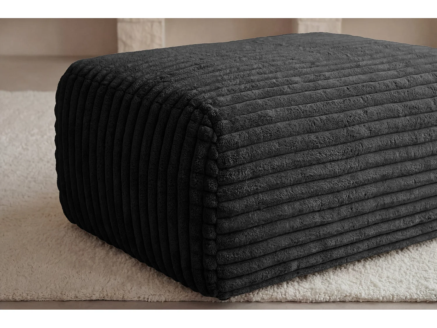 OLYMPE - Zwarte ribfluwelen poef 100x68x42 cm