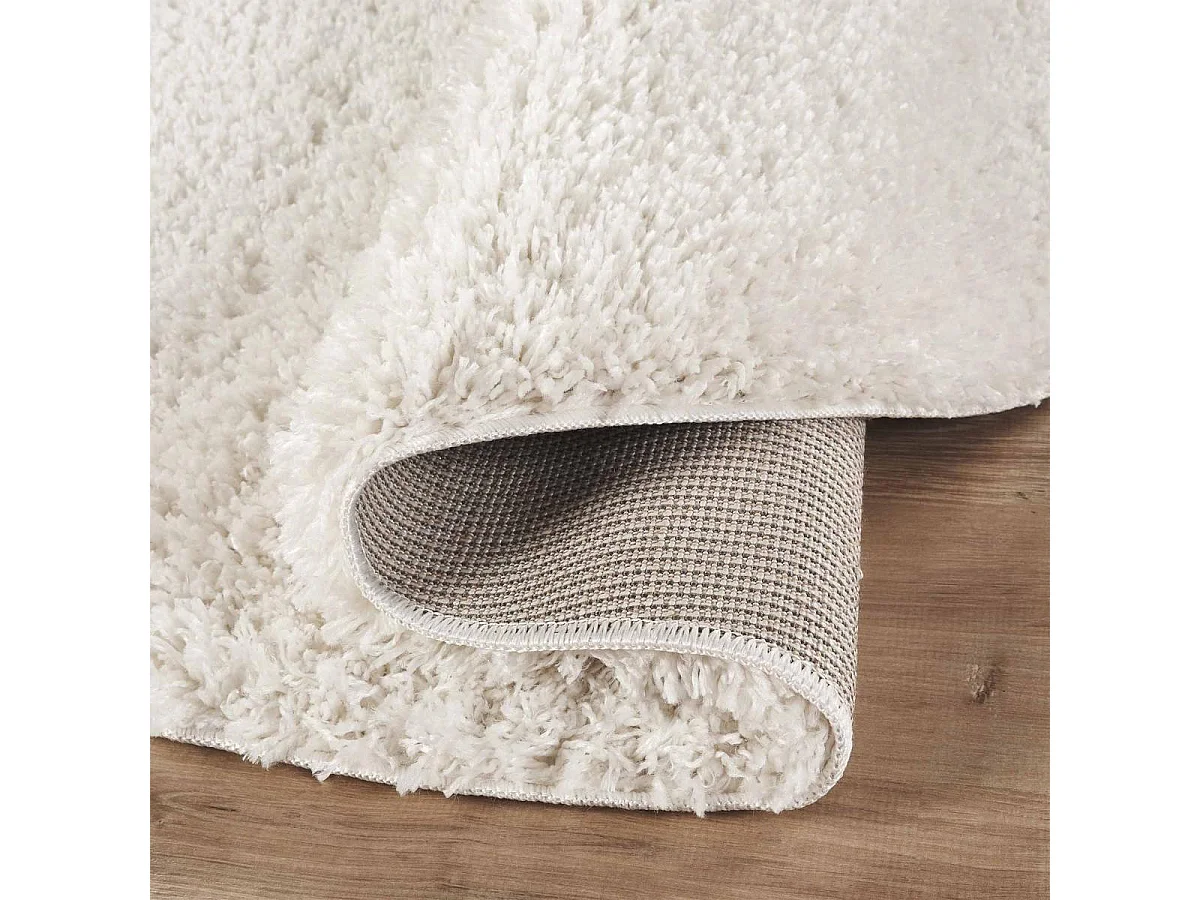 Tapis rond shaggy Ø160cm tissé crème motif uni LYN4 UNILA