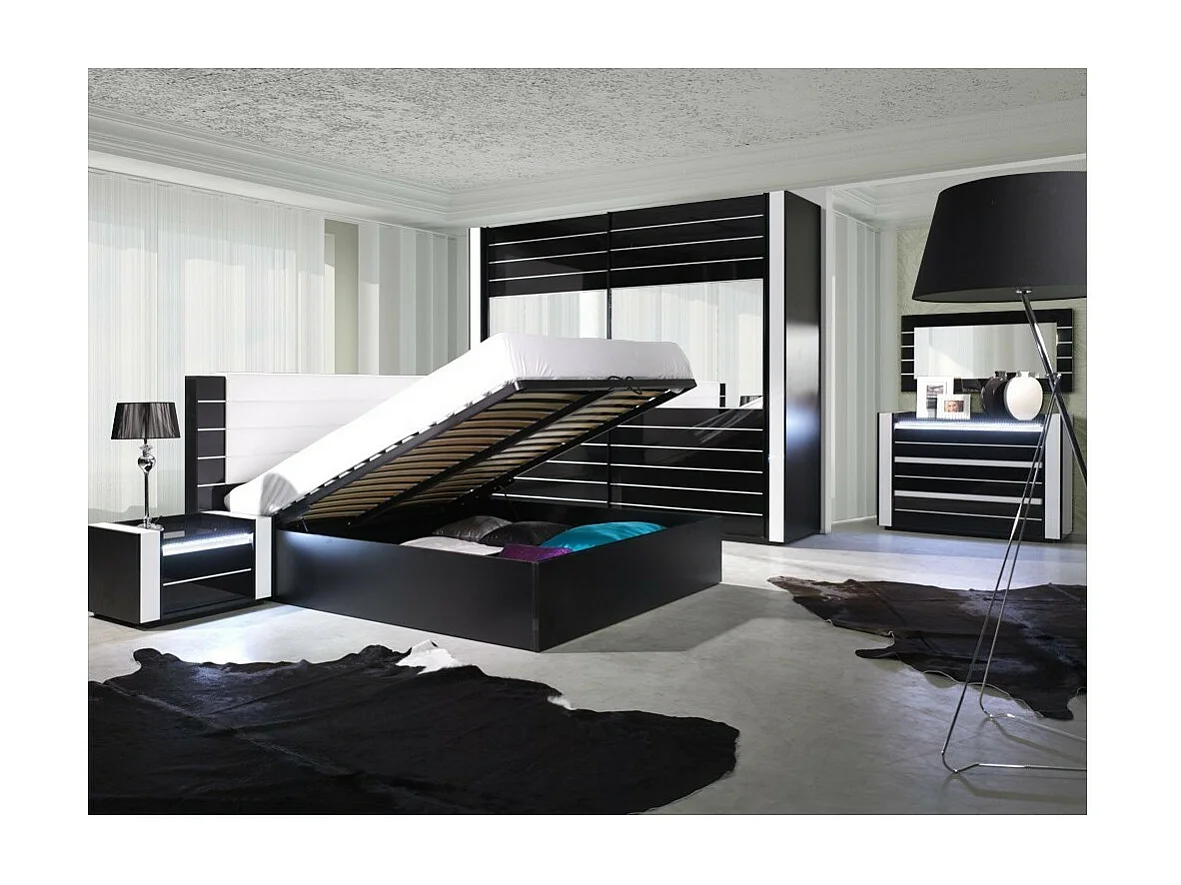 Cama de casal 160 cm com opção de baú LINA. Cores preto e branco brilhante com acabamento em couro sintético. Estrado incluído.