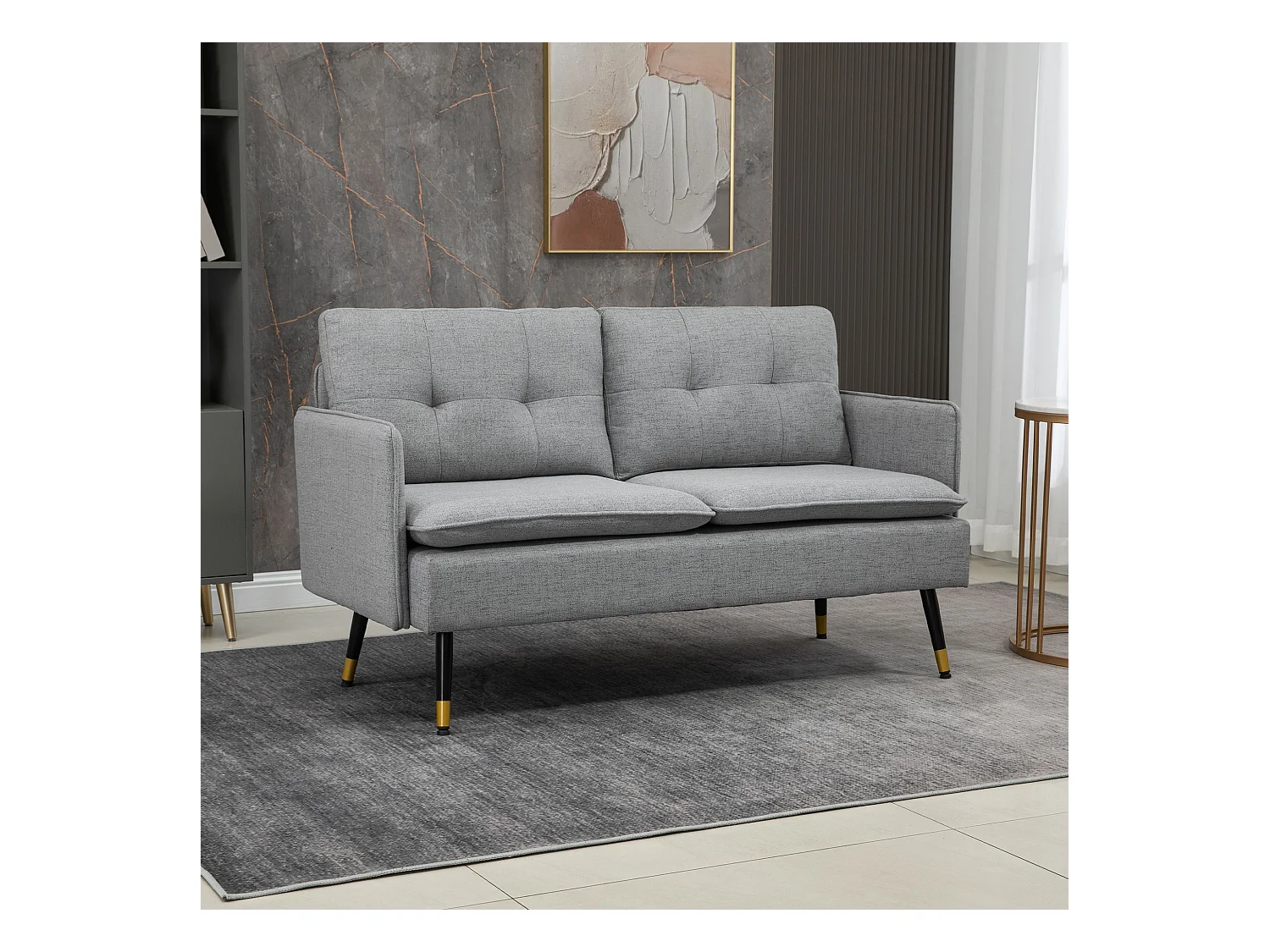 Canapé 2 places style art-déco dossier effet capitonné piètement incliné effilé métal noir extrémités dorées tissu gris