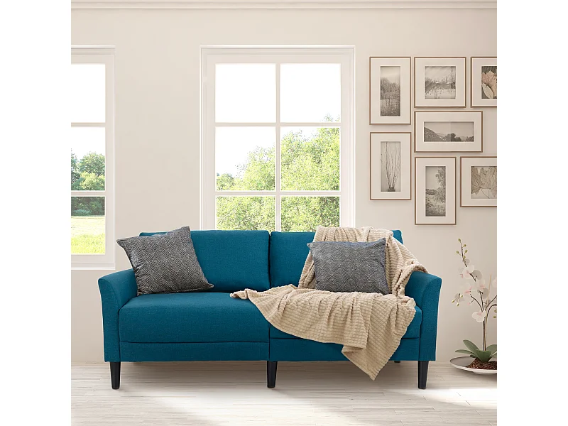 Canapé 2 places style contemporain assises larges profondes accoudoirs courbés piètement effilé bois hévéa noir polyester bleu canard