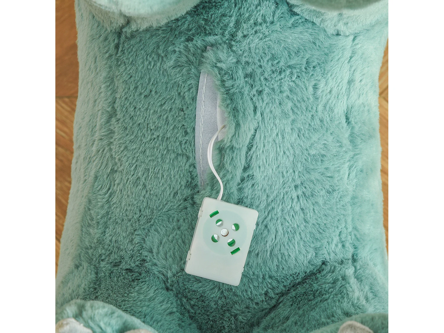 Jouet à bascule dinosaure effet sonore rugissement bois peuplier peluche courte polyester vert d'eau