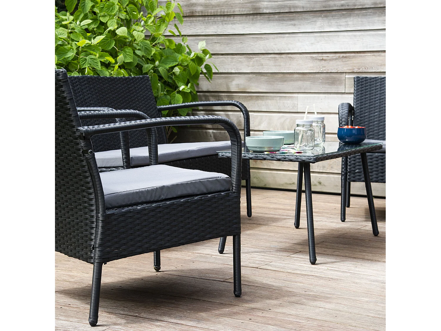 LIPARI tuinmeubelset in zwart gevlochten kunststof - grijze kussens