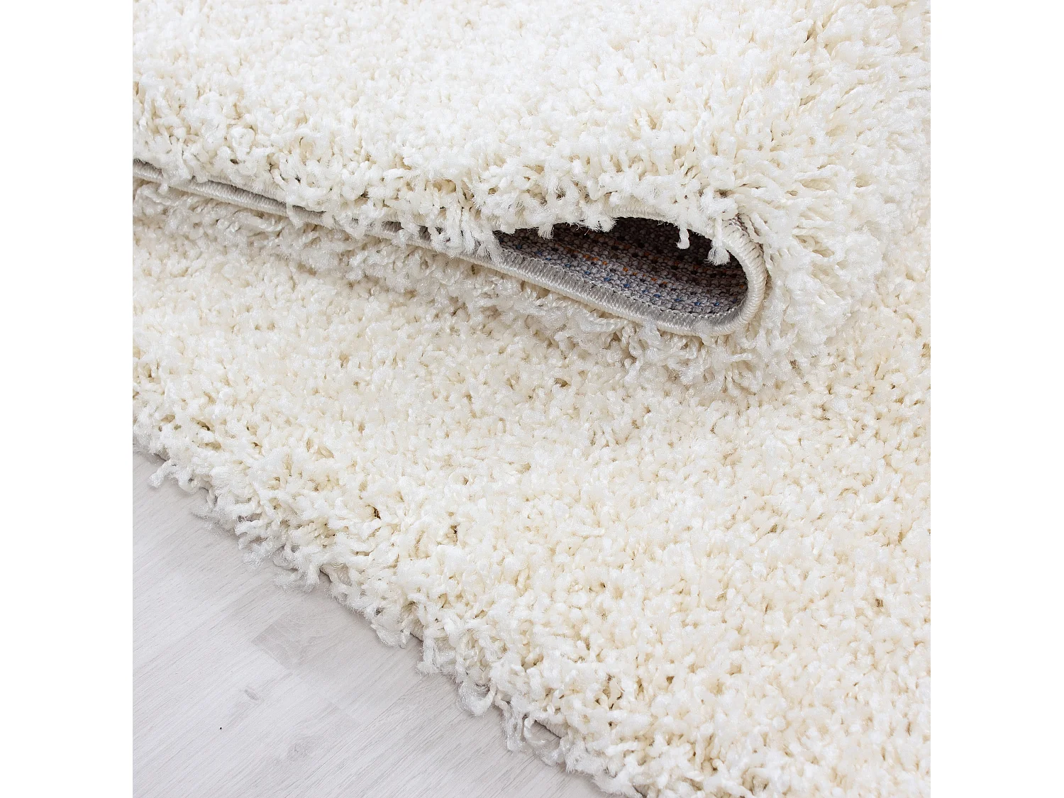 SHAGGY - Tapis Uni à poils longs - Blanc Ivoire 060 x 110 cm