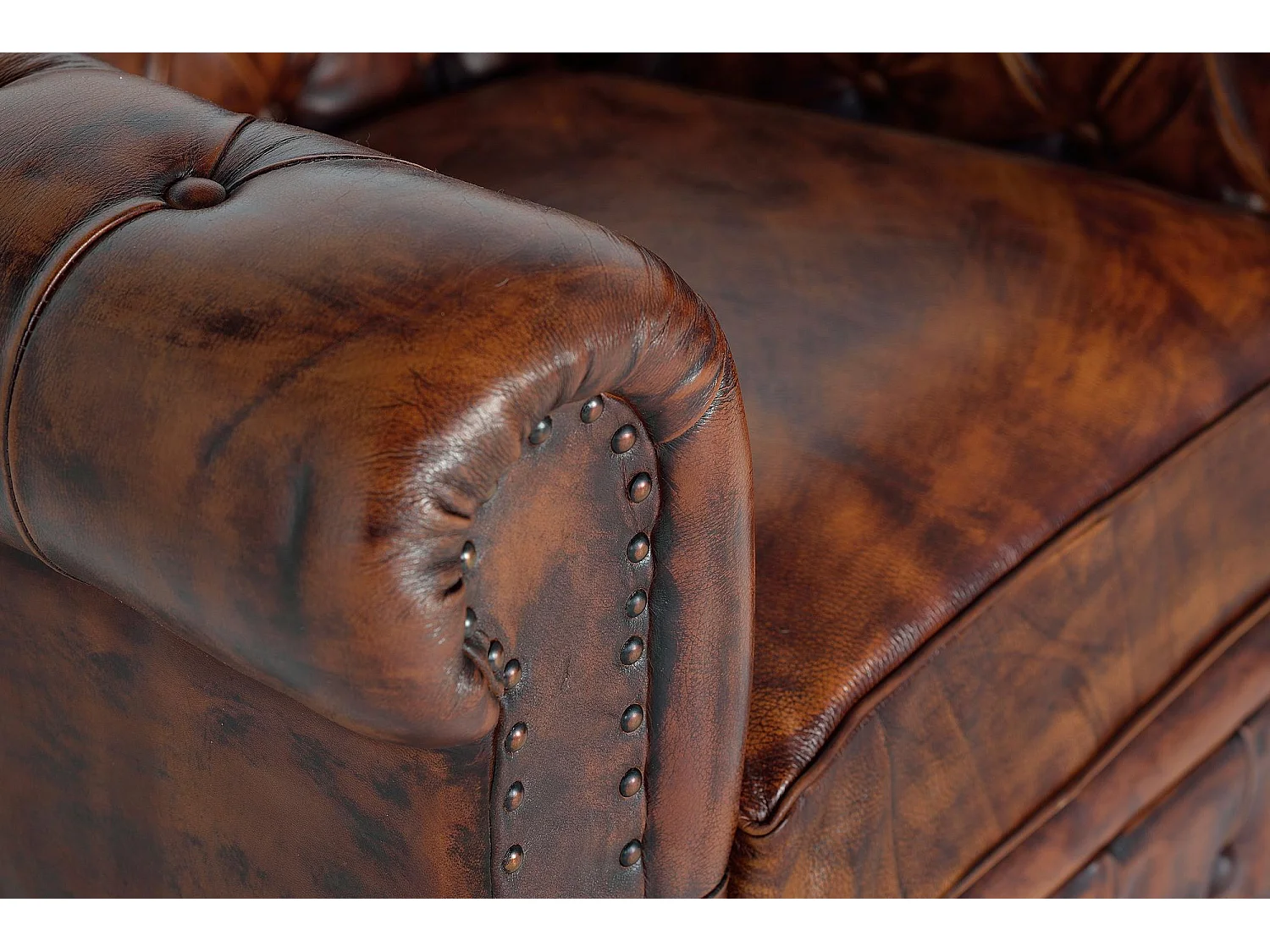 Sillón de cuero y metal marrón