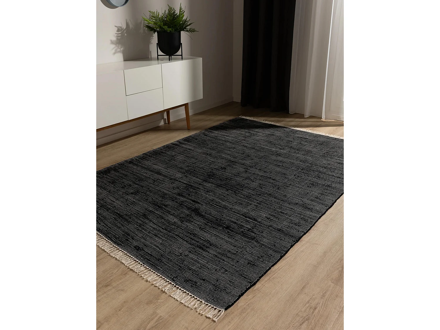 Tapis fabriqué à partir de matériaux recyclés Tom Noir 120x170 cm