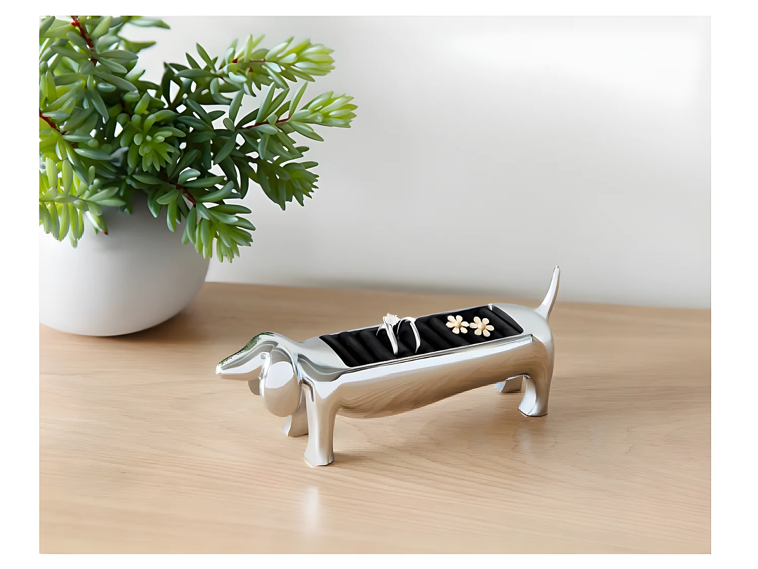 Porta anillos de zinc de perro salchicha