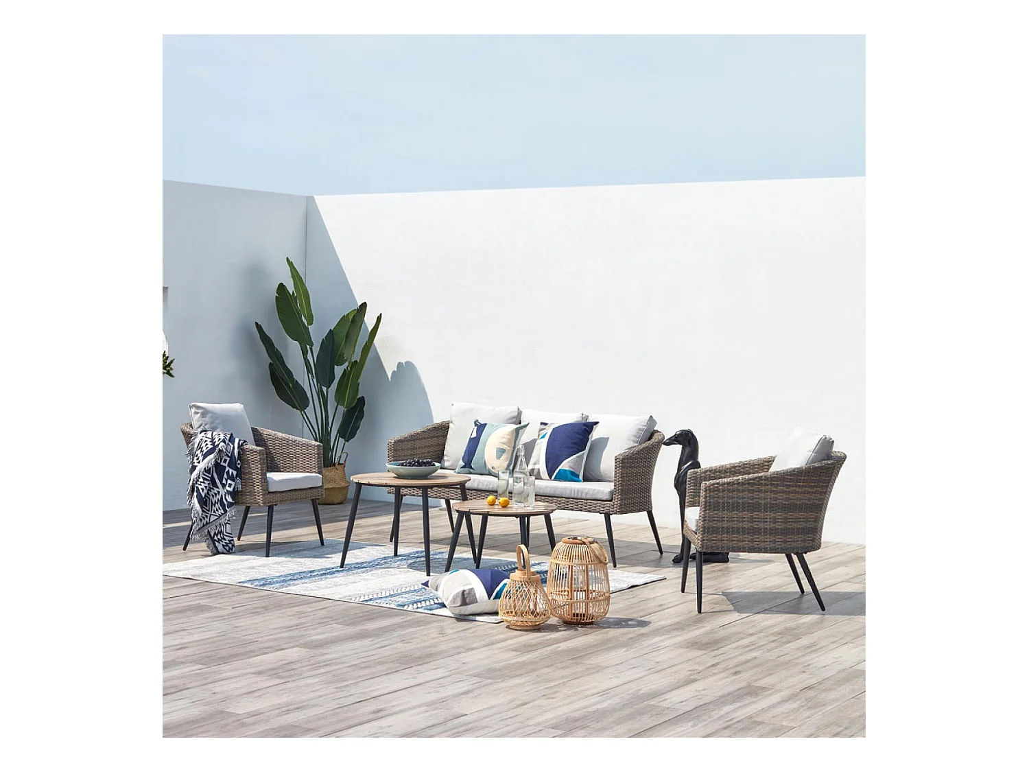 Loungeset Tibouta 5 plaatsen van gevlochten hars met schuine poten