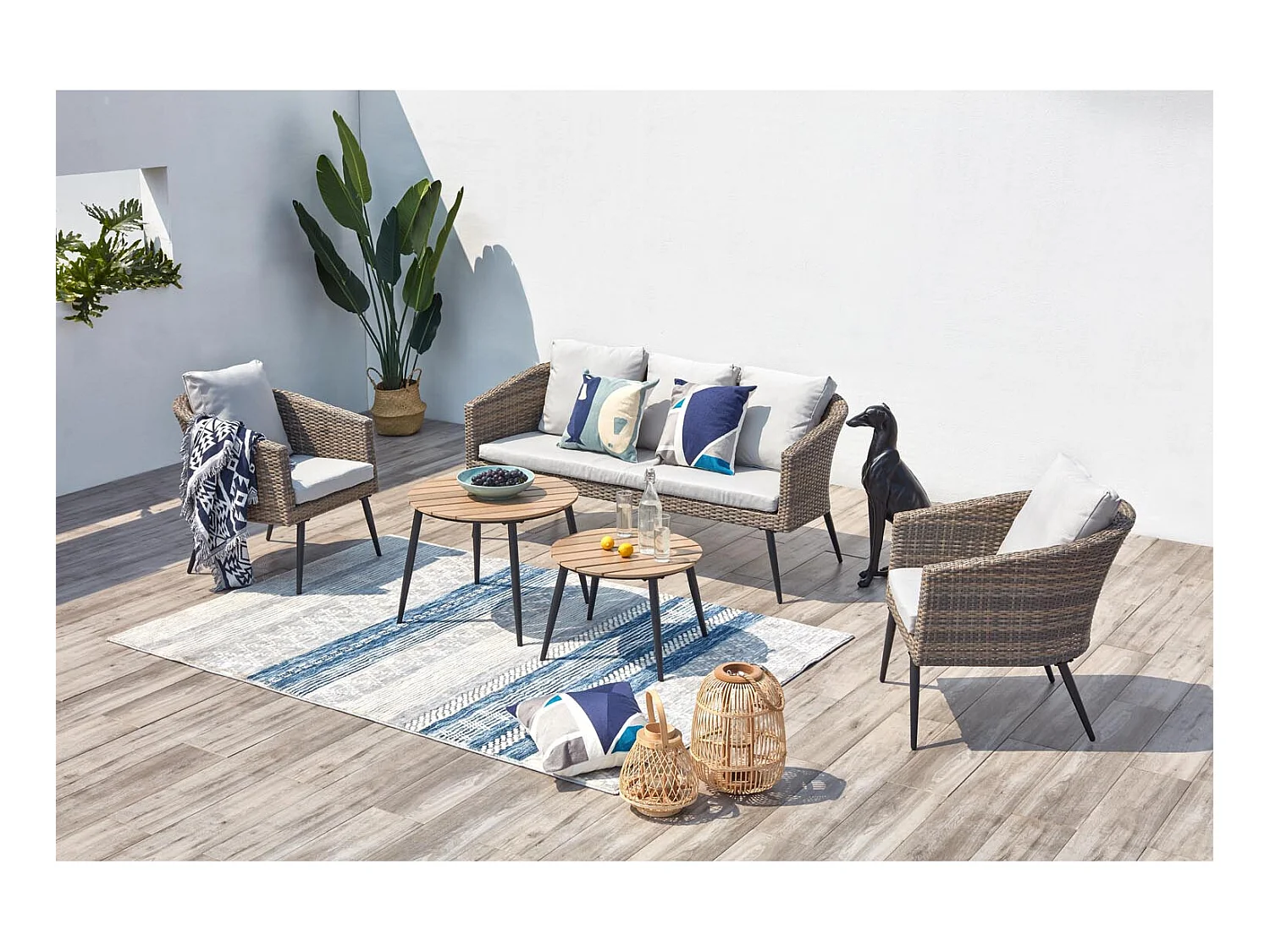 Loungeset Tibouta 5 plaatsen van gevlochten hars met schuine poten