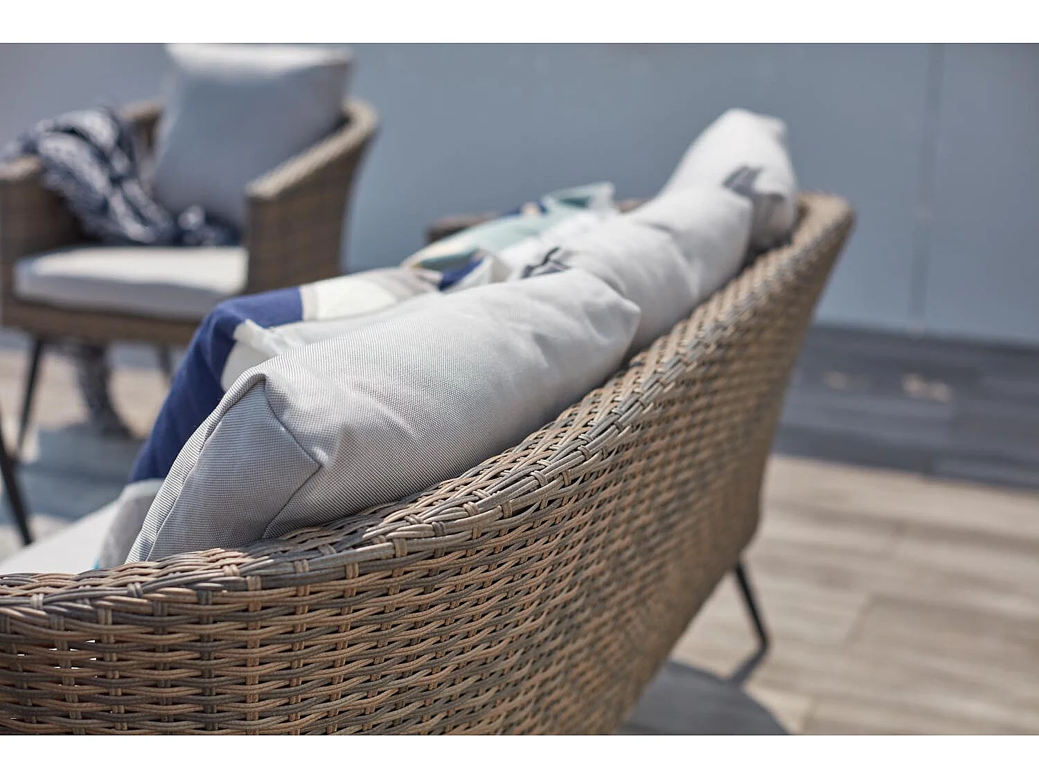 Loungeset Tibouta 5 plaatsen van gevlochten hars met schuine poten