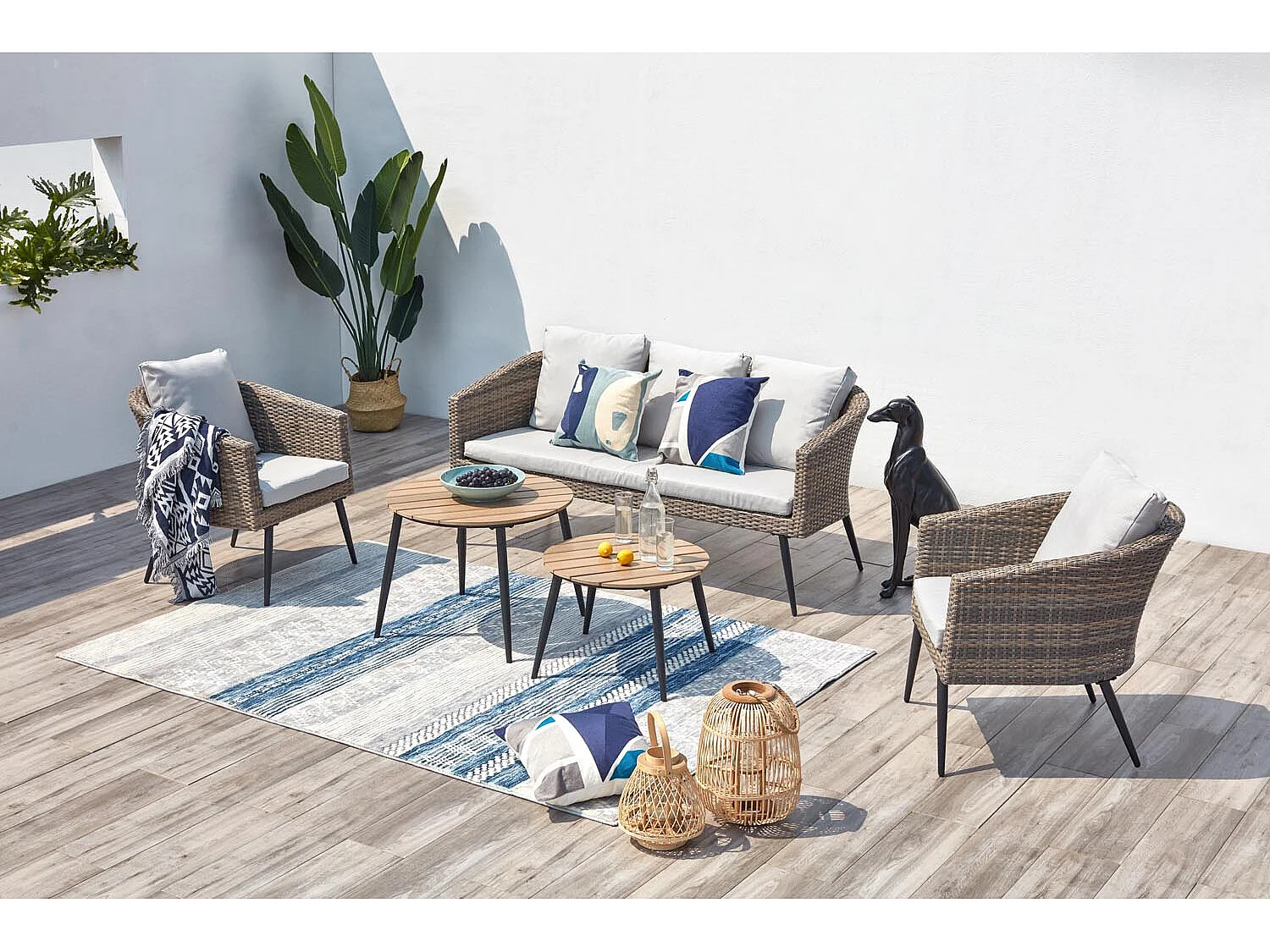 Loungeset Tibouta 5 plaatsen van gevlochten hars met schuine poten