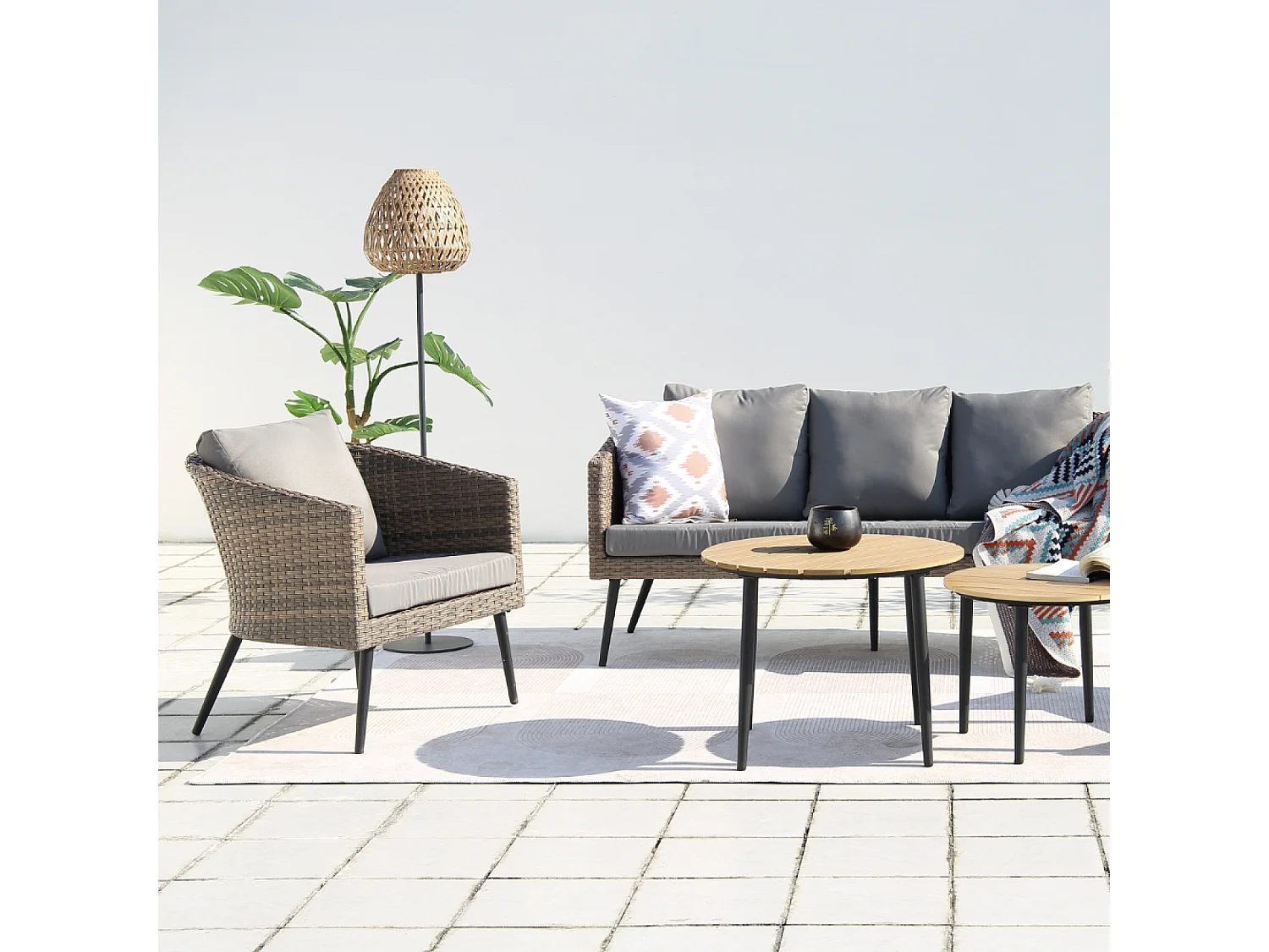 Loungeset Tibouta 5 plaatsen van gevlochten hars met schuine poten