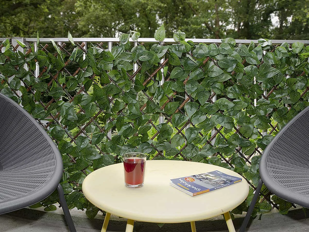 Treillis extensible en osier avec feuillage PE Laurier palme 180 x 90 cm - Nature