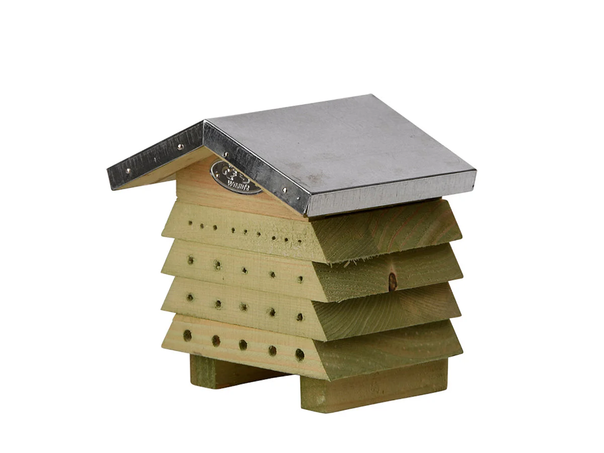 Casa de abejas de madera y zinc