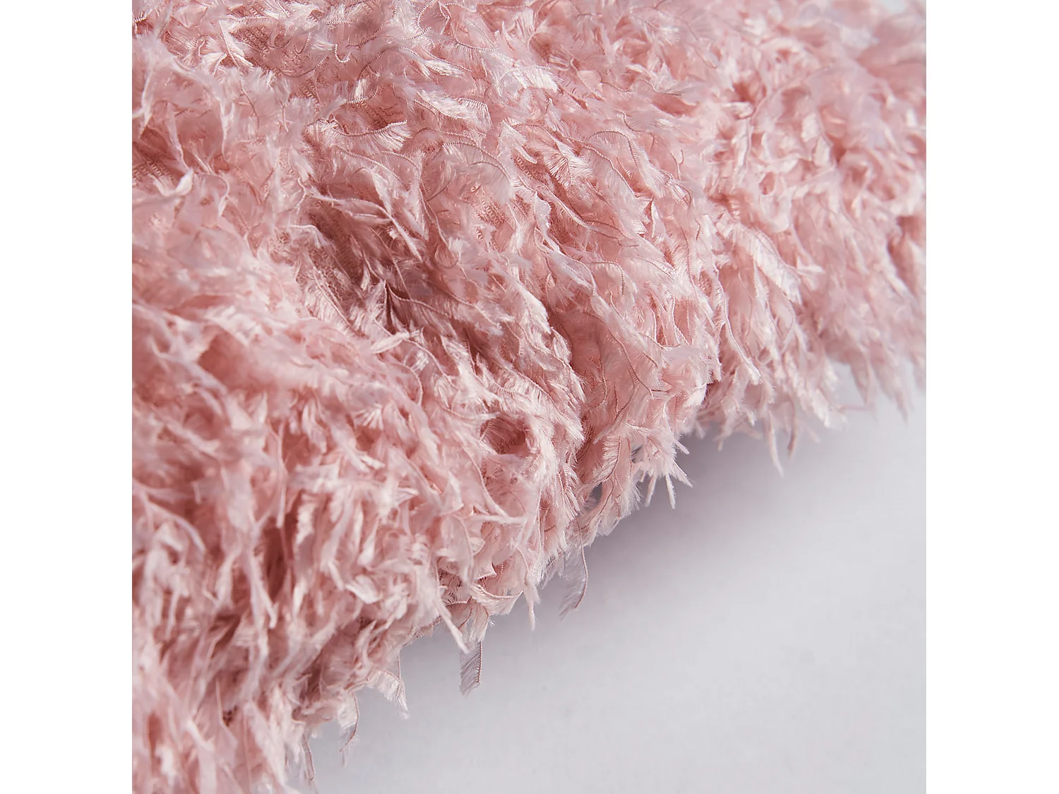 Cojín de poliéster en color rosa de 42x42x10cm