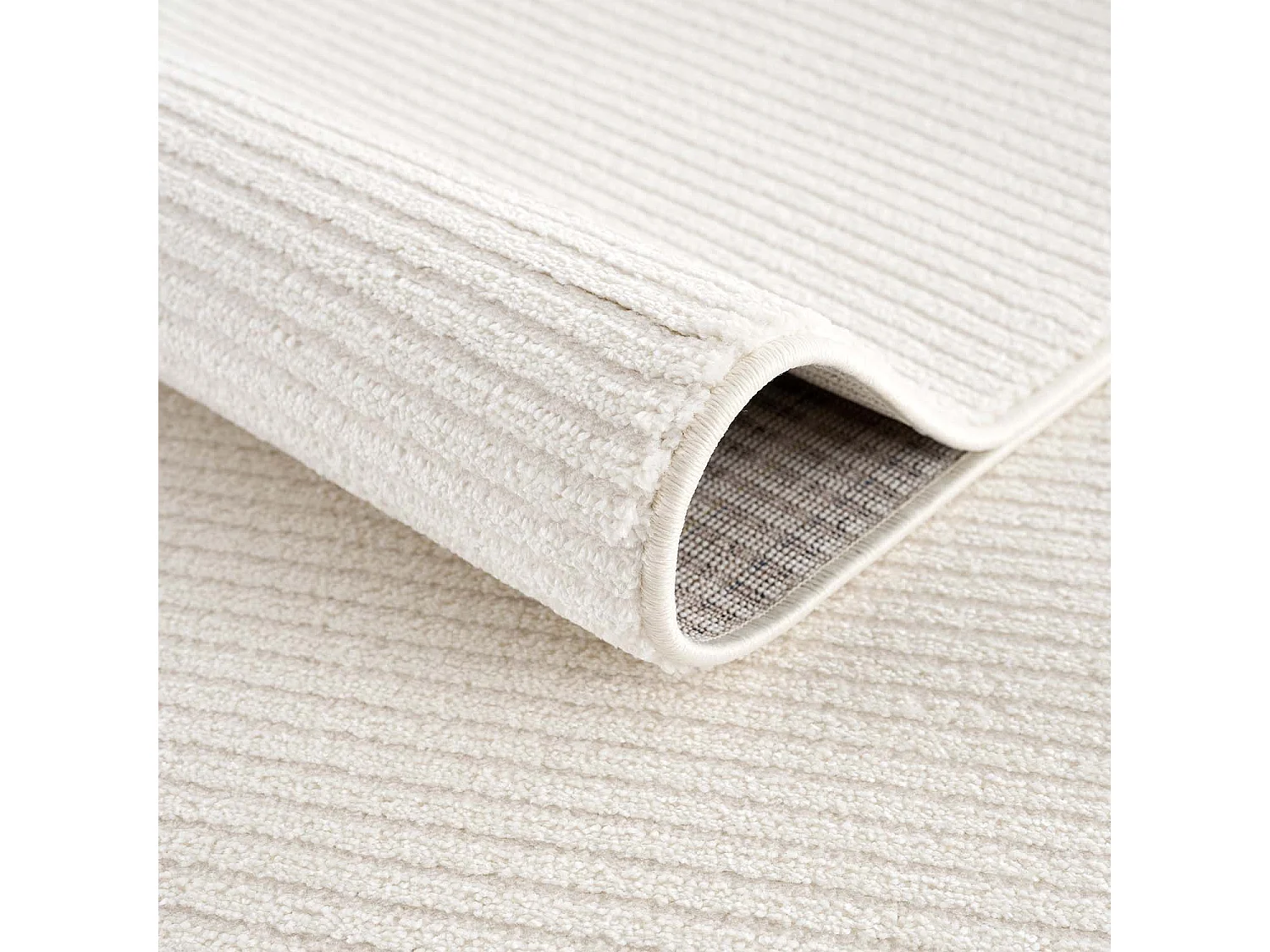 TARA - Tapis uni blanc à relief linéaire 80x300cm