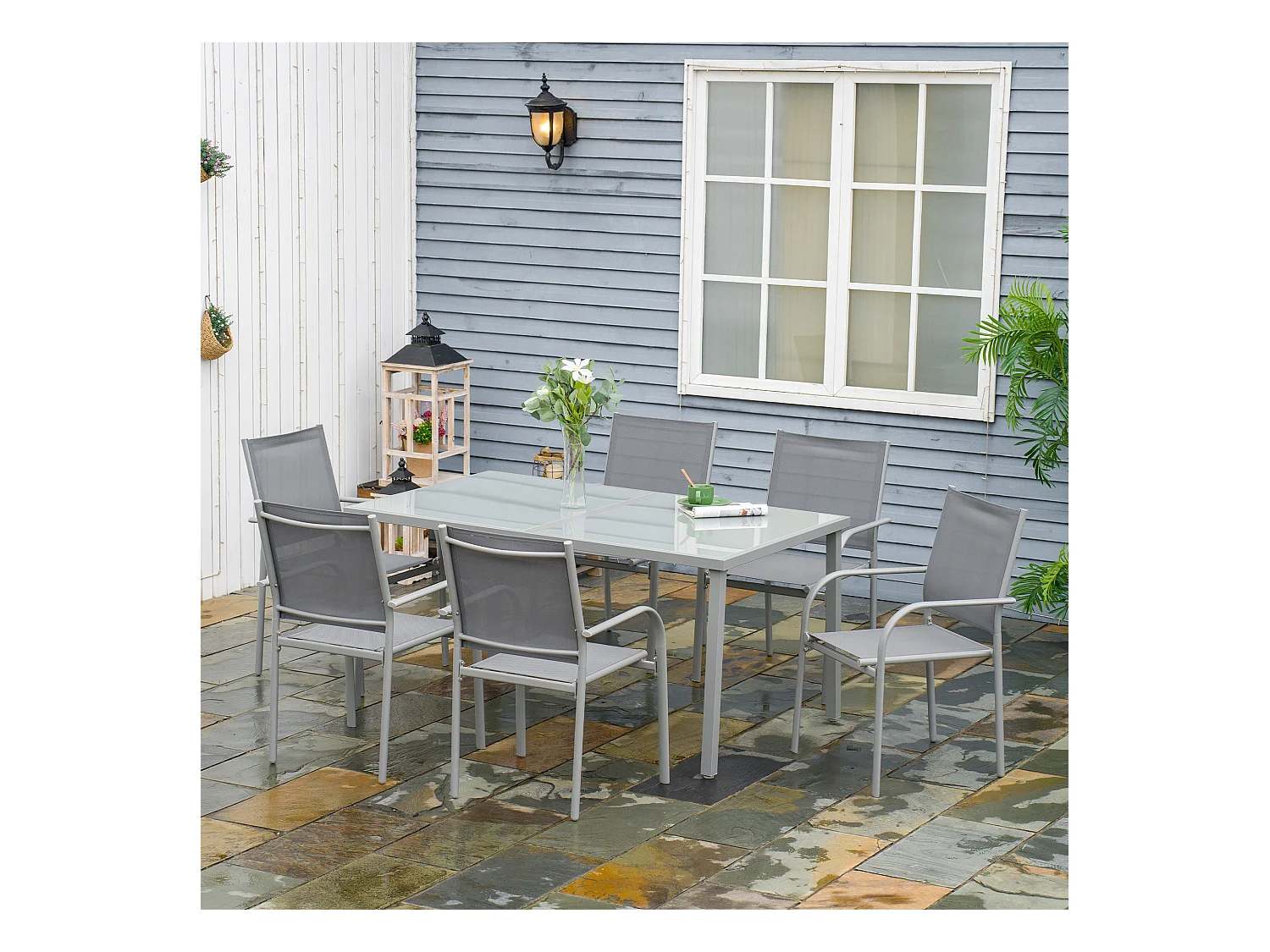 Ensemble de jardin 6 personnes chaises empilables table à manger dim. 150L x 90l x 72H cm plateau verre acier époxy textilène gris