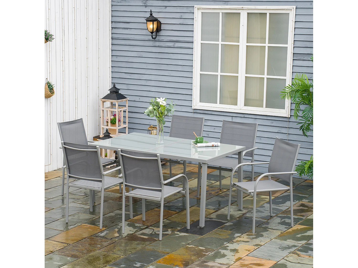 Ensemble de jardin 6 personnes chaises empilables table à manger dim. 150L x 90l x 72H cm plateau verre acier époxy textilène gris