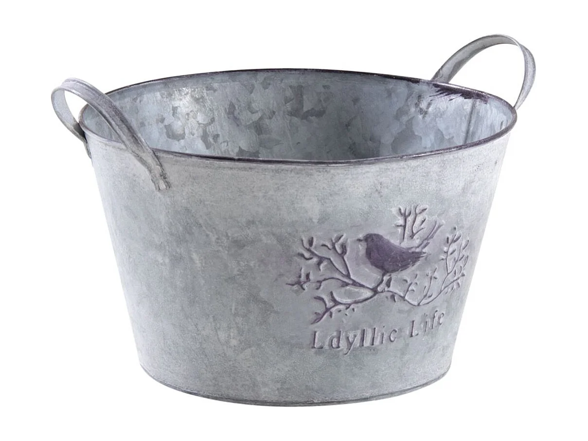 Corbeille ronde en métal patiné oiseau