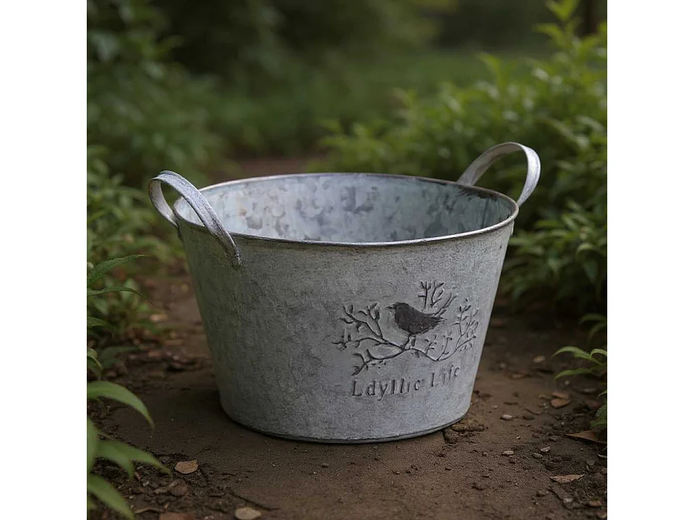 Corbeille ronde en métal patiné oiseau