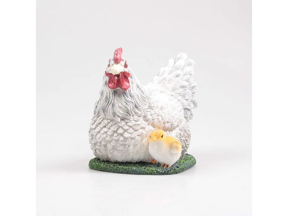 Poule couvant avec poussin en résine 17 x 23 x 19 cm