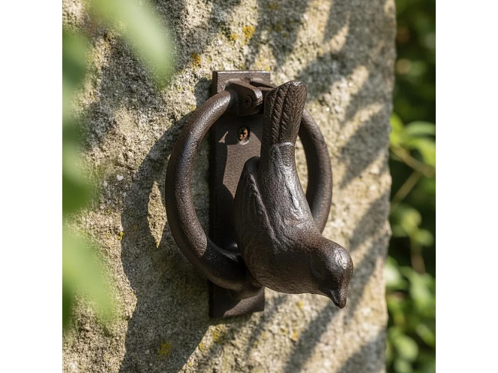 Battente in ghisa con uccello