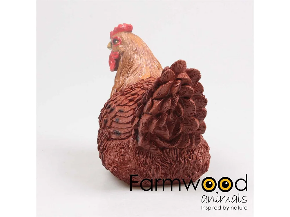 Poule marron couvant en résine