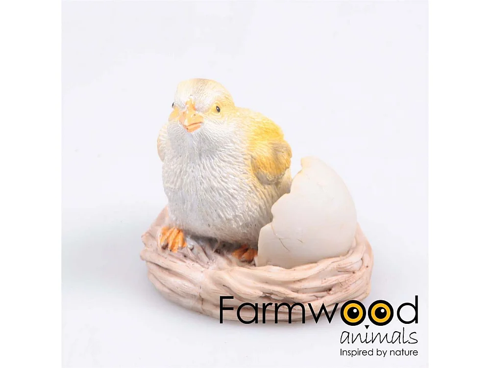 Poussin avec oeuf cassé en résine 10 x 9 x 11 cm