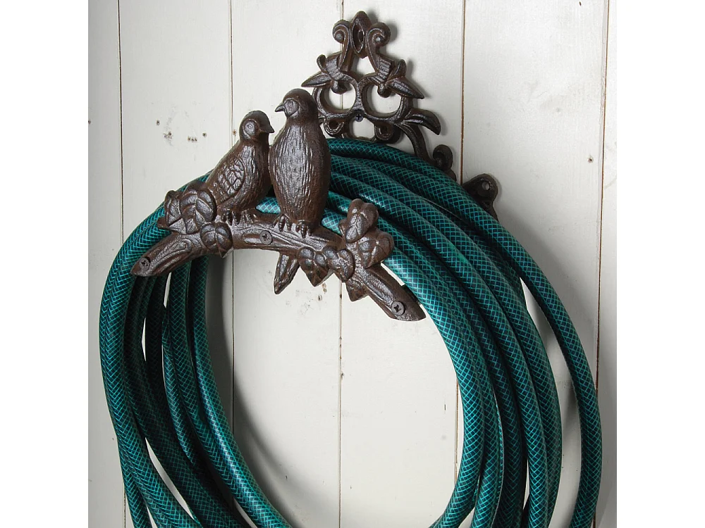 Porta tubi in ghisa per uccelli