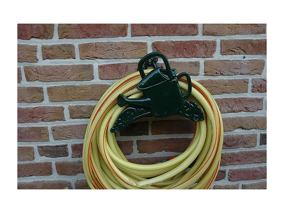 Original portamangueras de pared de hoja de Ginko de acero