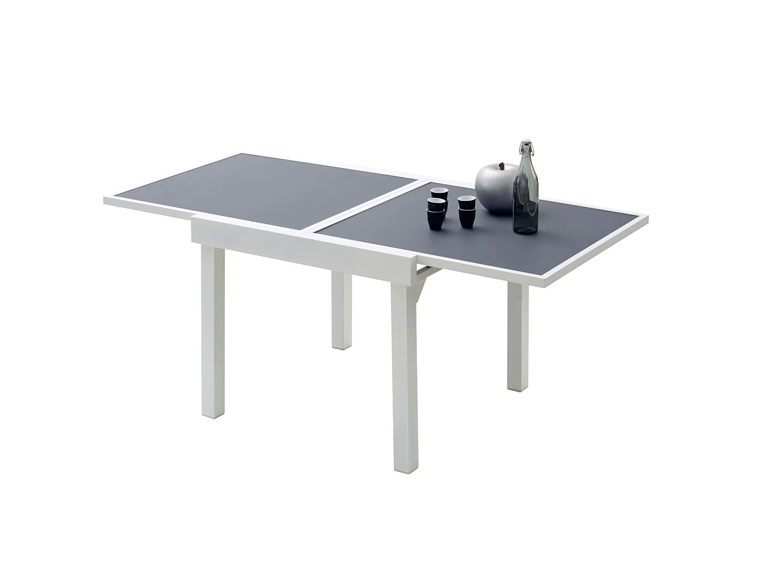 Table Modulo 4/8 personnes structure en aluminium blanche. plateau en verre coloris gris perle