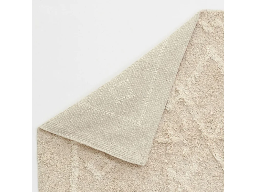 Tapis en coton tufté écru motifs ethniques 90 x 150 cm
