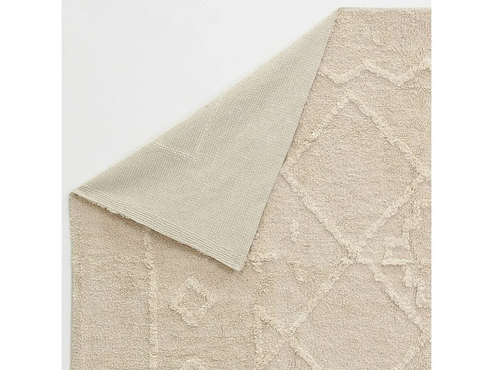 Tapis en coton tufté écru motifs ethniques 140 x 200 cm