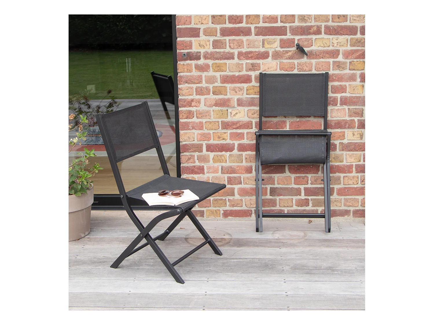 Chaises pliantes Modulo aluminium noire et assise textilène noir