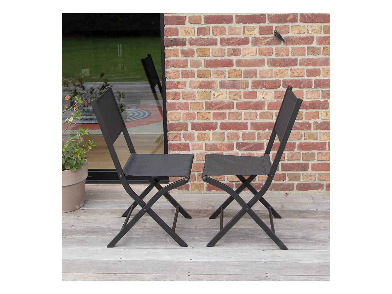 Chaises pliantes Modulo aluminium noire et assise textilène noir