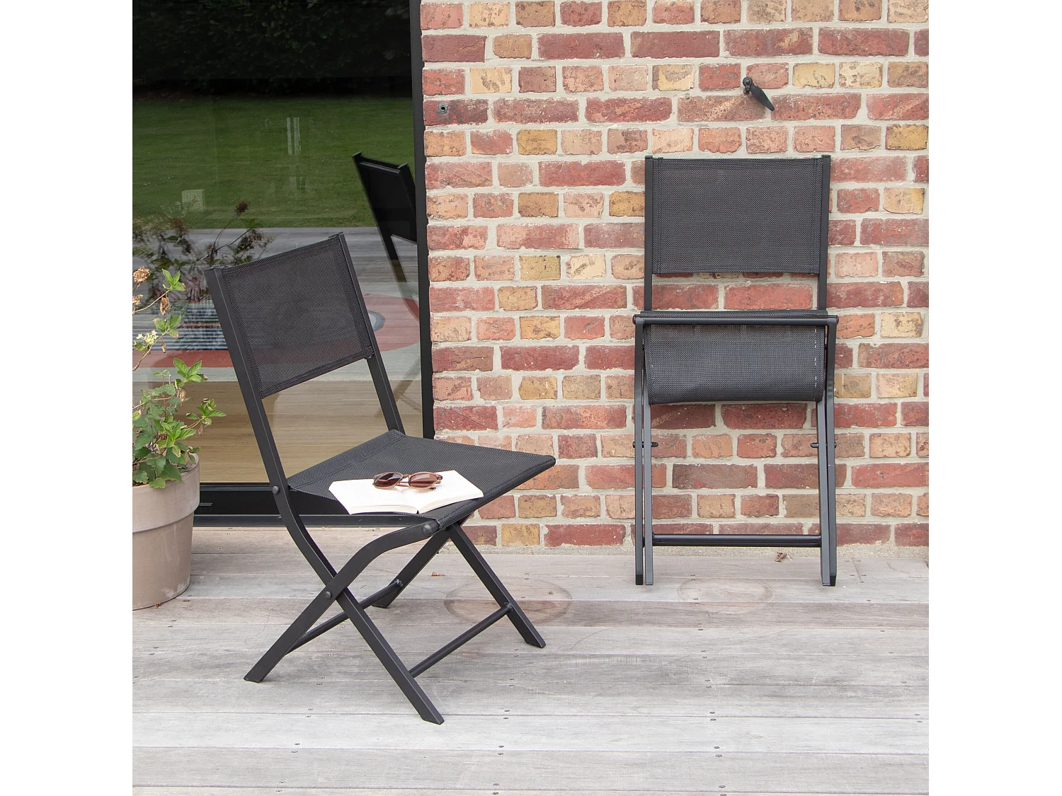 Chaises pliantes Modulo aluminium noire et assise textilène noir