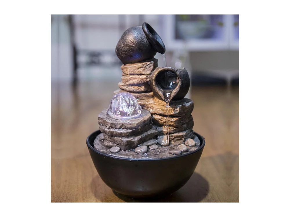 Fuente de resina Naturaleza verso