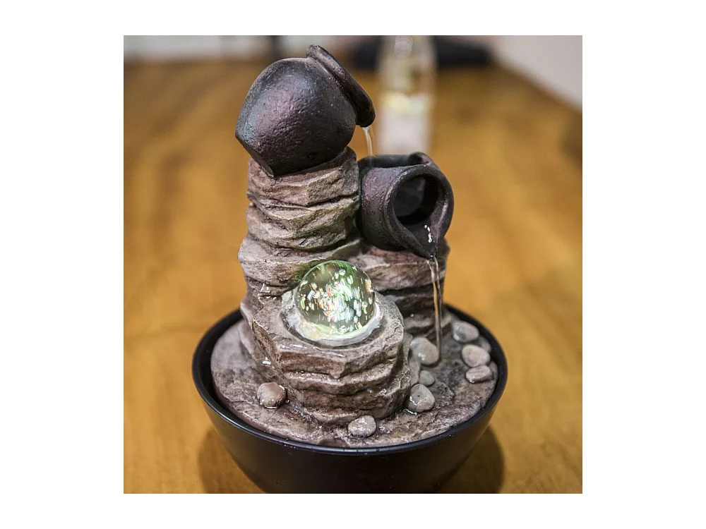 Fuente de resina Naturaleza verso