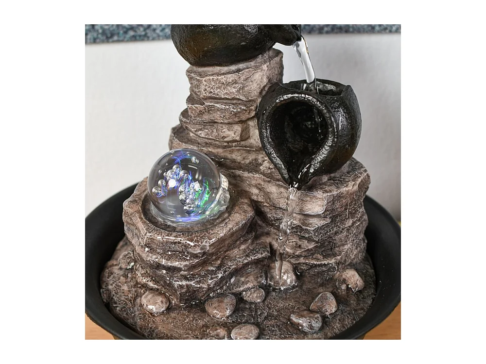 Fuente de resina Naturaleza verso