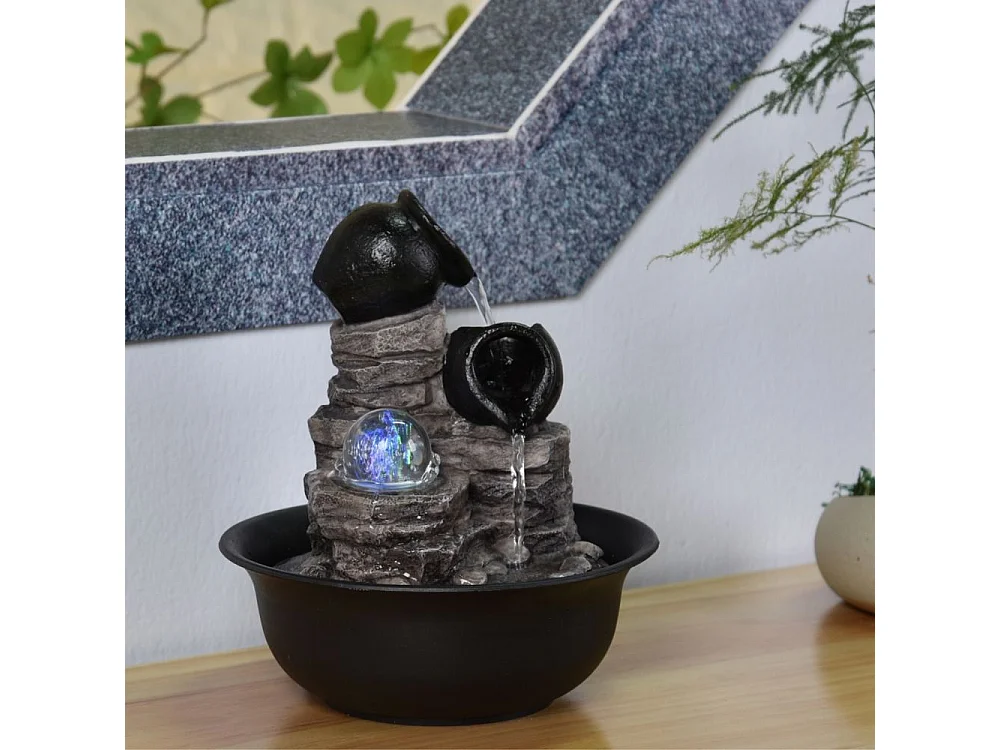 Fuente de resina Naturaleza verso