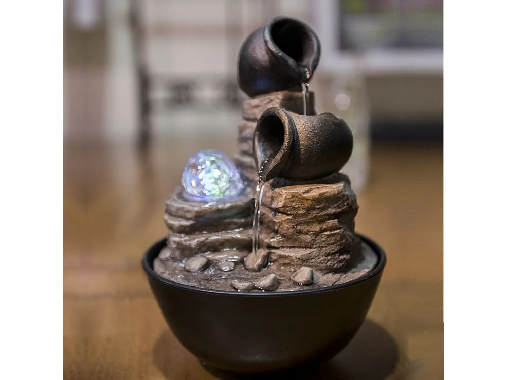 Fuente de resina Naturaleza verso
