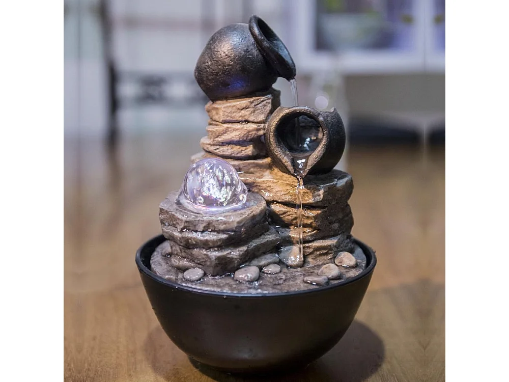 Fuente de resina Naturaleza verso