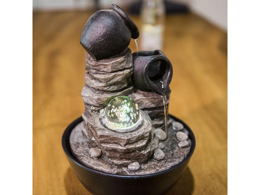 Fuente de resina Naturaleza verso