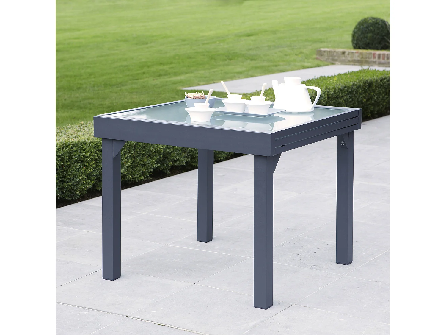 Ensemble MODULO 4/8p en aluminium gris et verre modulable et 4 fauteuils aluminium et assise en textilène