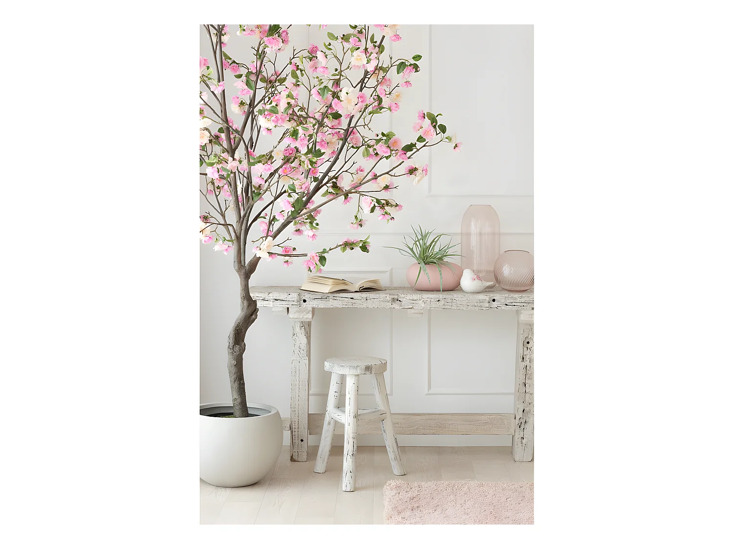 Jarrón redondo acanalado de vidrio rosa de 25x25x25 cm