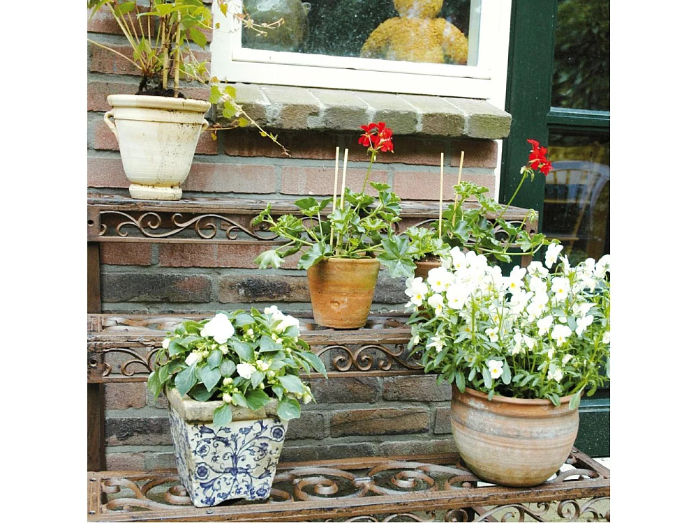 Etagère à plantes en métal patiné Arabesque