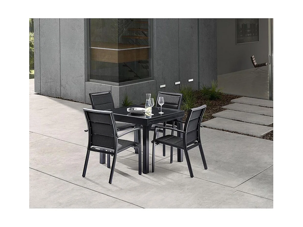 Table Modulo 4/8 personnes structure en aluminium noire, plateau en verre noir