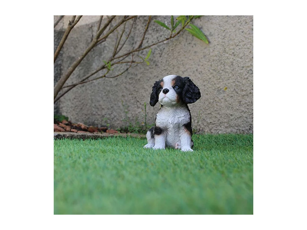 Chiot king charles assis en résine 15 cm