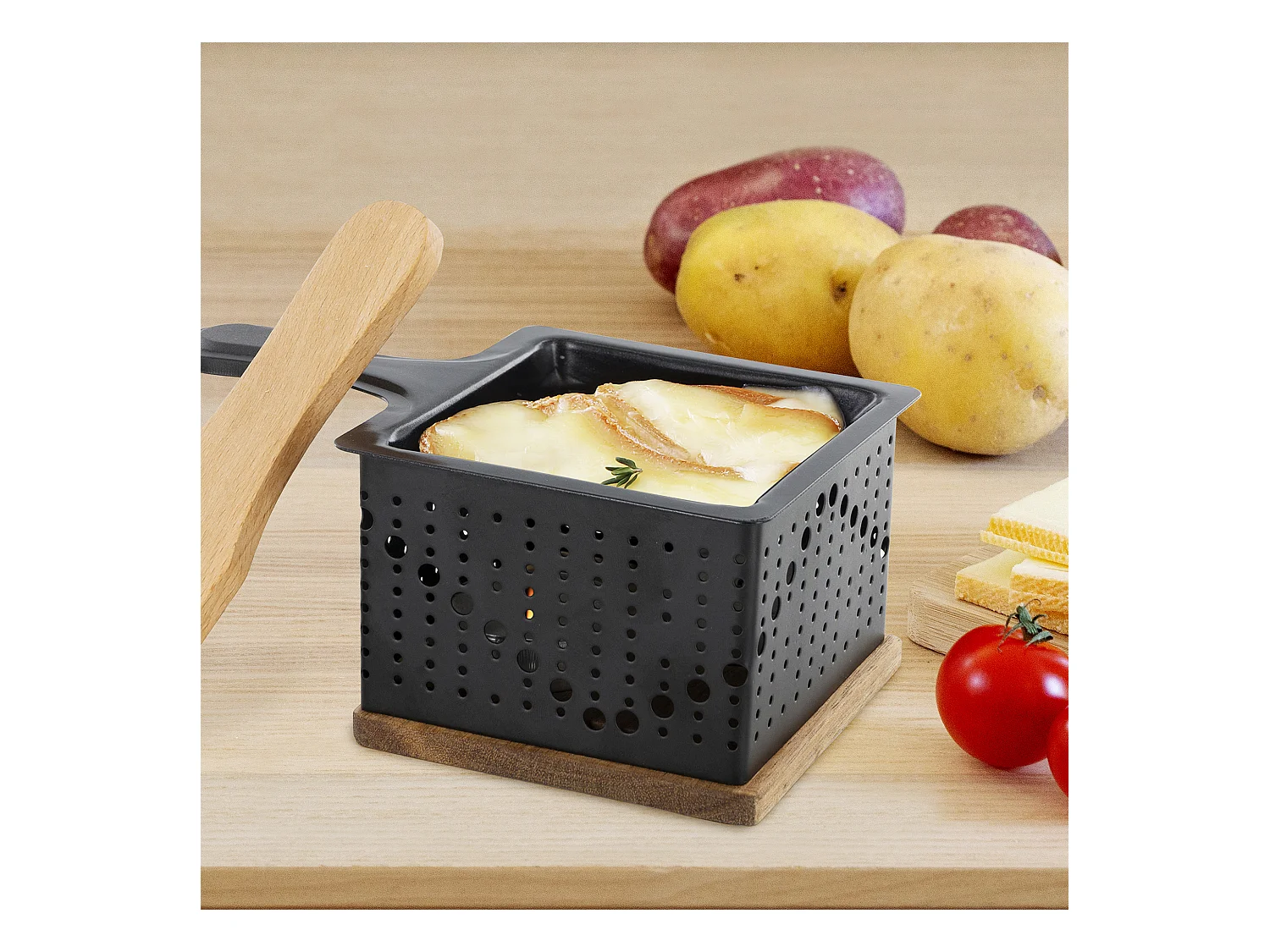 Raclette individual a la luz de las velas