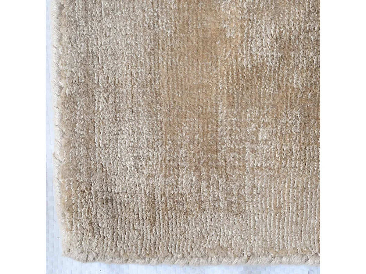 tapis salon 200x300 fait à la main en viscose beige rectangle motif uni NEO +